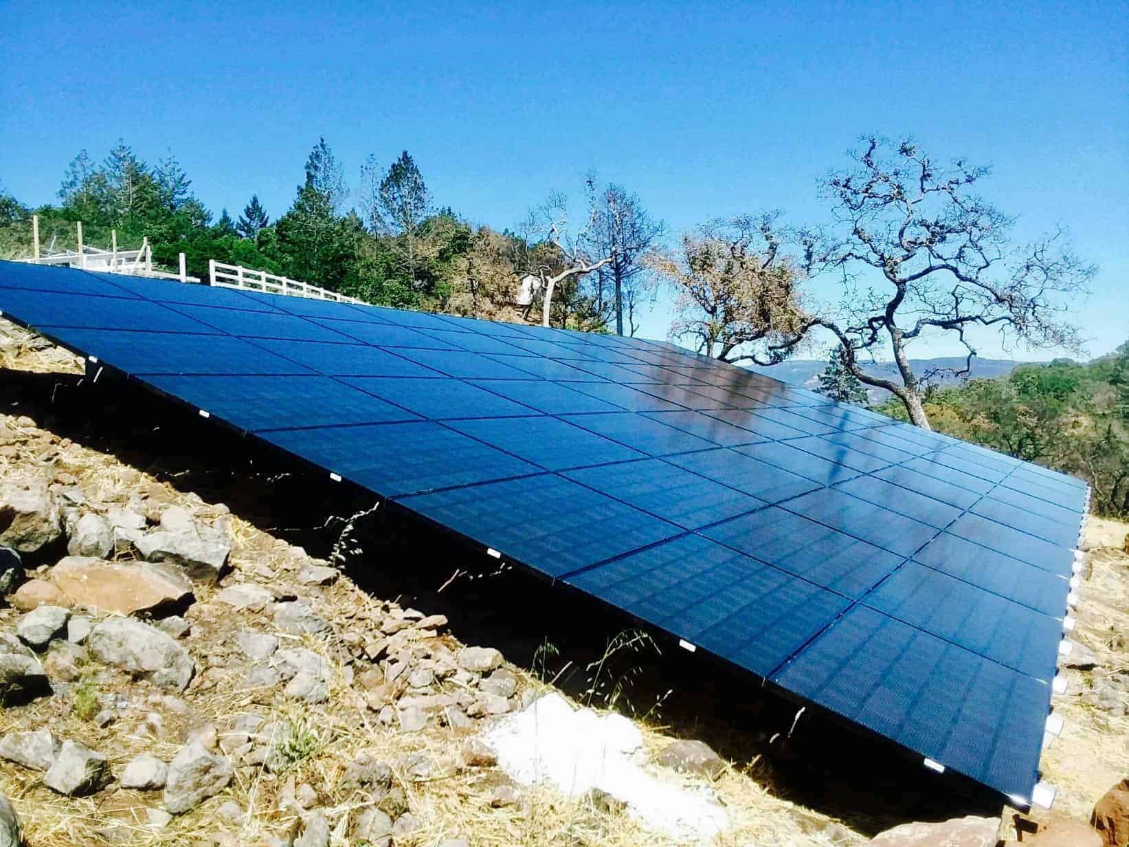 A ground mount solar panel array by Michael & Sun Solar